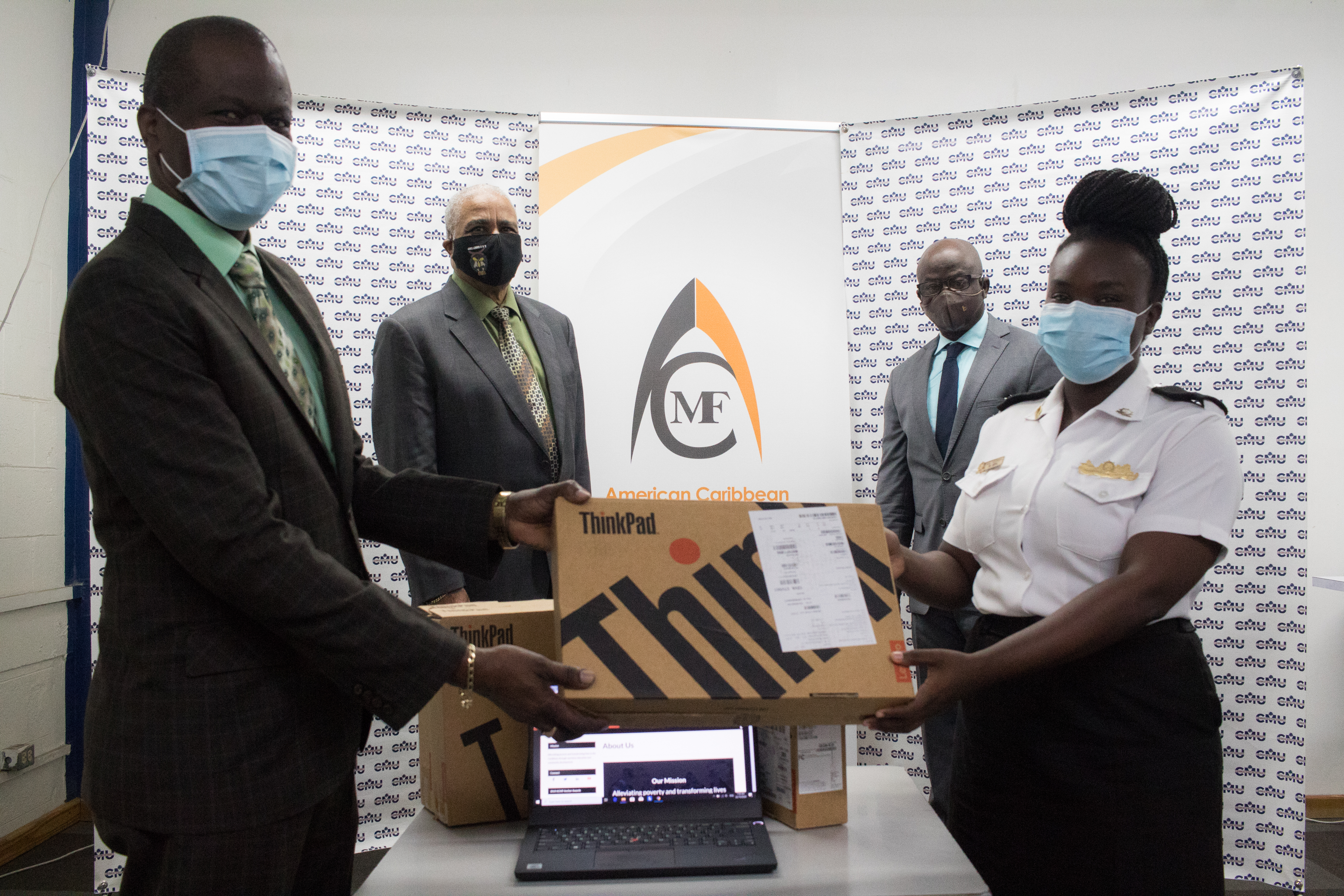 CMU receives laptop donation from ACMF